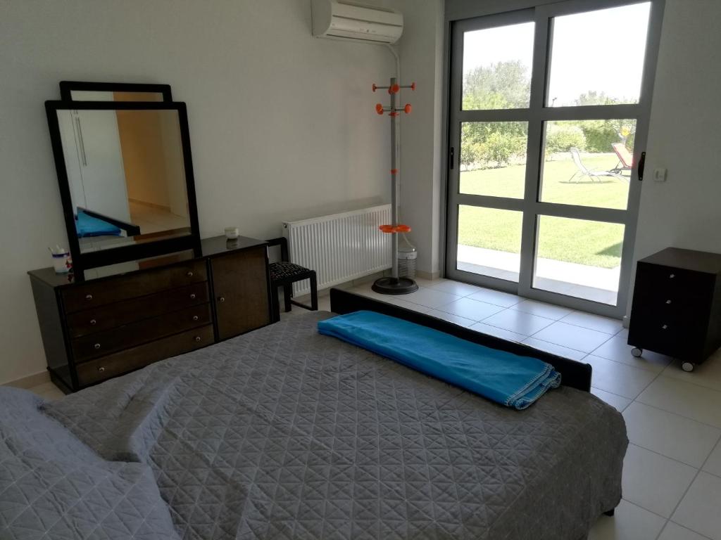 Postel nebo postele na pokoji v ubytování Dimitra