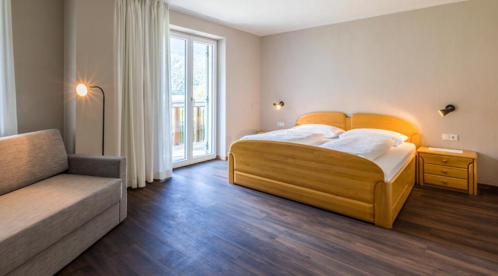 Postel nebo postele na pokoji v ubytování Hotel Untermelz