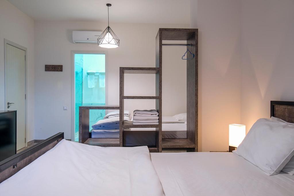 Postel nebo postele na pokoji v ubytování Hotel Opinion