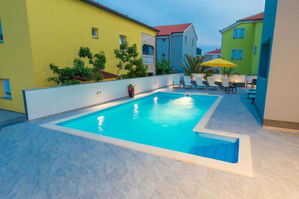 Πισίνα στο ή κοντά στο Lucky Luke Pool Apartments