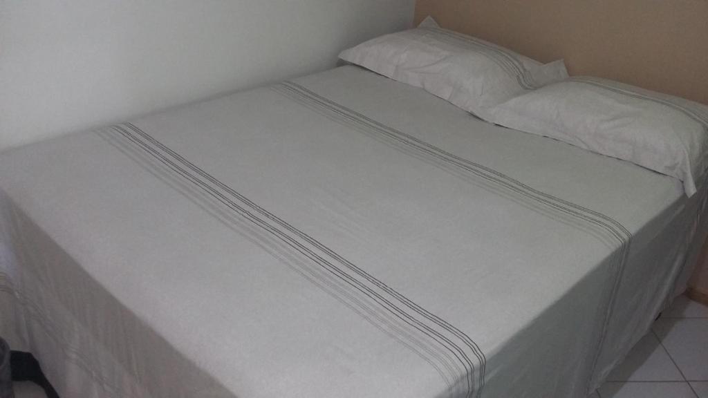 Postel nebo postele na pokoji v ubytování Chalé Porto dos Lençóis