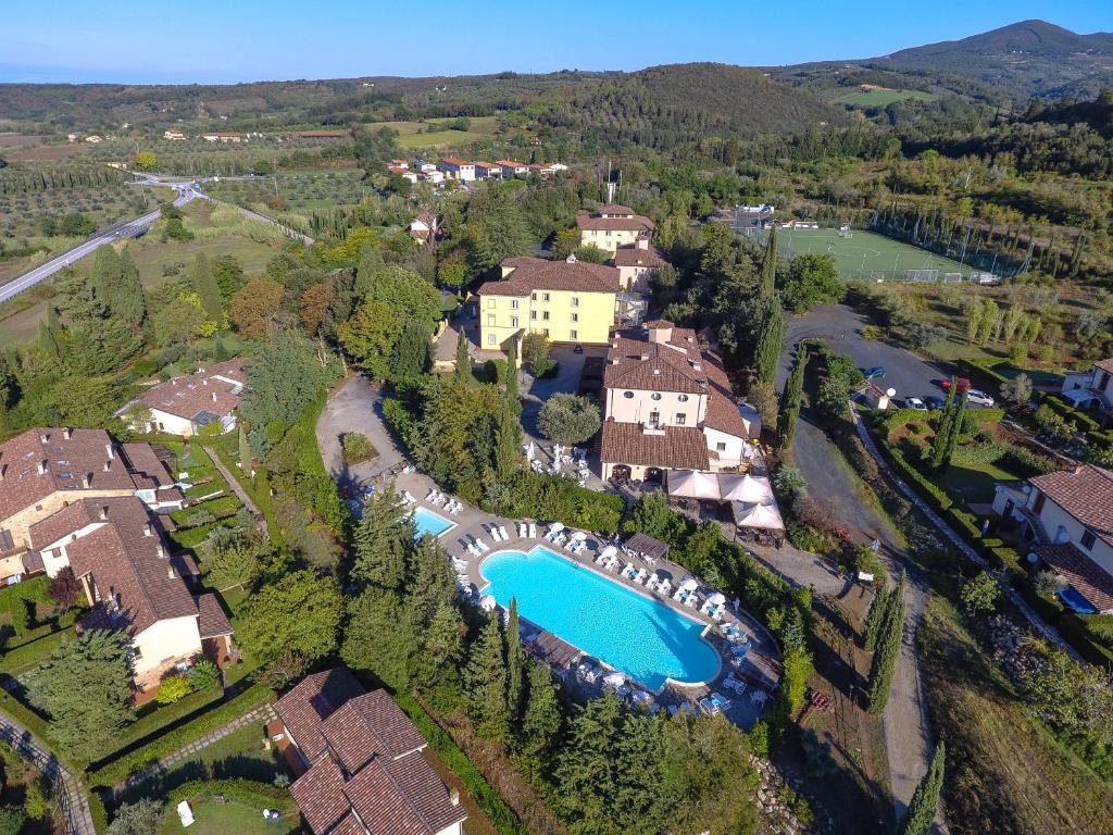 an aerial view of a estate with a swimming pool at San Martino Hotel Wellness in Riparbella