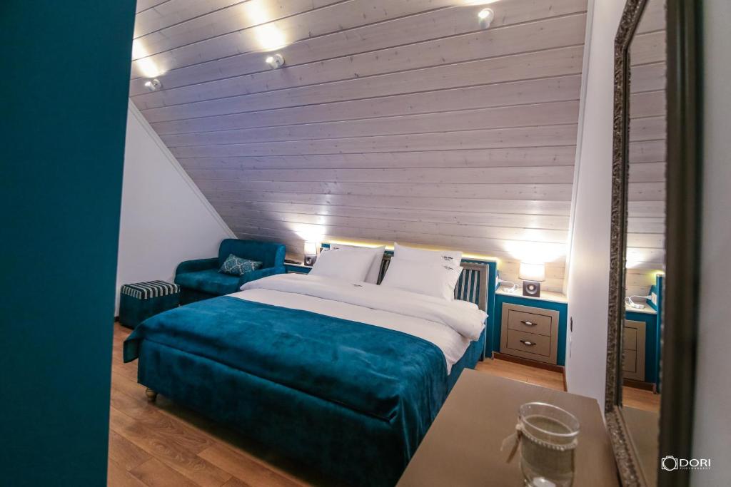 Postel nebo postele na pokoji v ubytování Hotel Restaurant Vila Ime Voskopoje