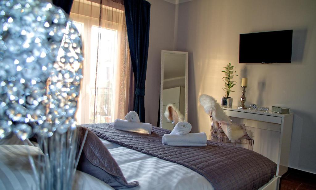 Posteľ alebo postele v izbe v ubytovaní Apartman Nia