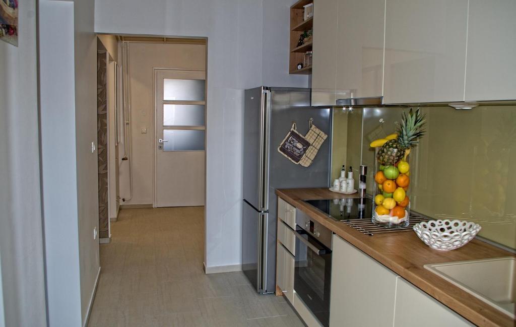 Kuchyňa alebo kuchynka v ubytovaní Apartman Nia