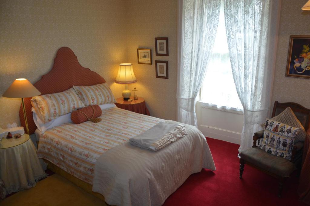 Postel nebo postele na pokoji v ubytování Scaurbridge House