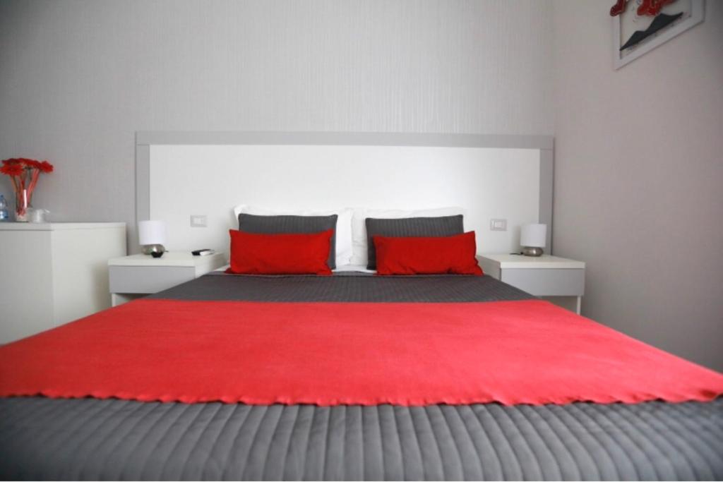 Łóżko lub łóżka w pokoju w obiekcie Chiaia Guest House