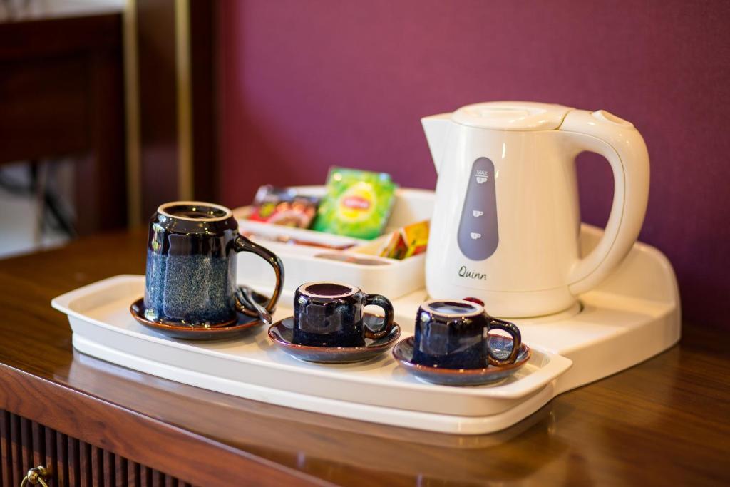 Příslušenství pro přípravu čaje a kávy v ubytování Sapa Horizon Hotel
