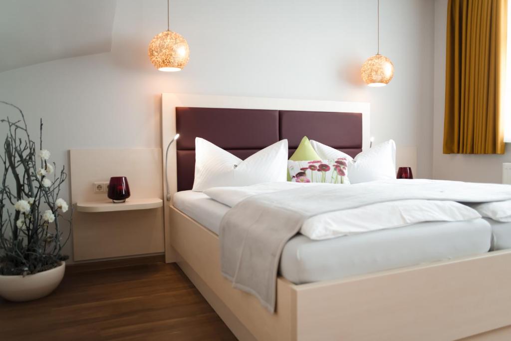 Ένα ή περισσότερα κρεβάτια σε δωμάτιο στο Altstadt-Apartment