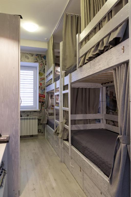 Postel nebo postele na pokoji v ubytování Art house Hostel