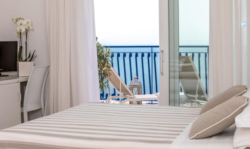 Postel nebo postele na pokoji v ubytování Hotel Plaza Esplanade