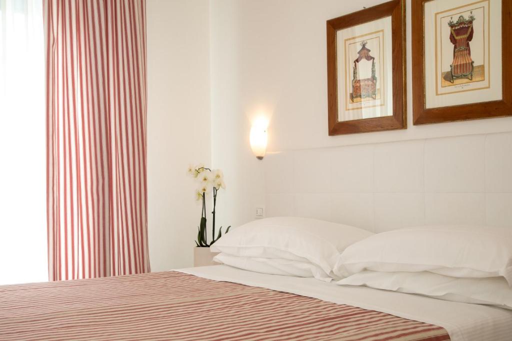 Postel nebo postele na pokoji v ubytování Hotel Plaza Esplanade