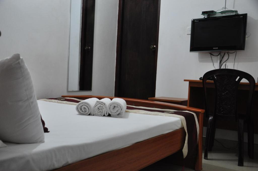 Postel nebo postele na pokoji v ubytování Villa Hotel