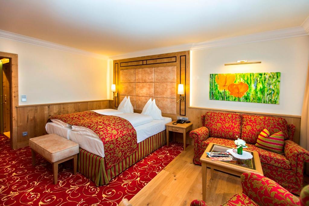 Postel nebo postele na pokoji v ubytování Hotel Hubertushof