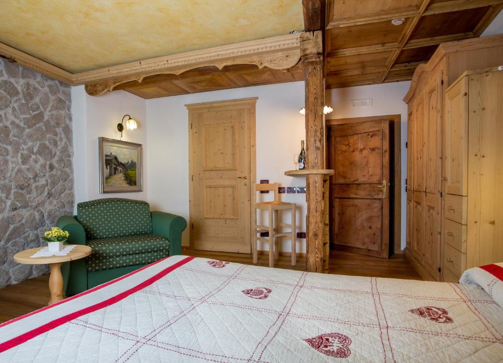 Postel nebo postele na pokoji v ubytování Historic Hotel Ristorante La Stua