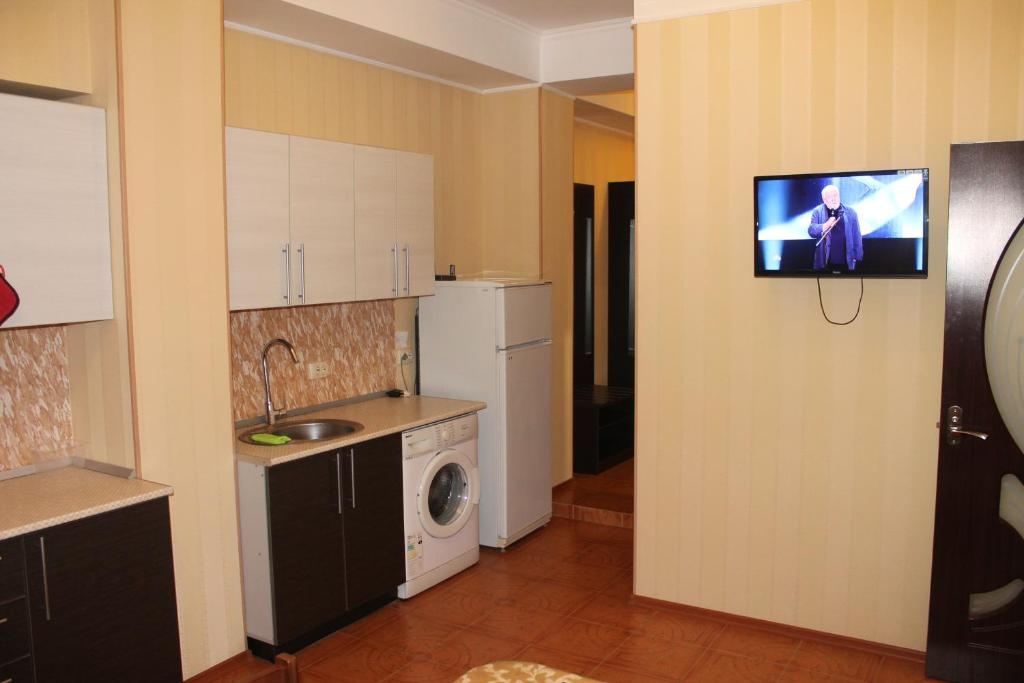  Virtuve vai virtuves zona naktsmītnē Apartment in Kurortnyi Gorodok 