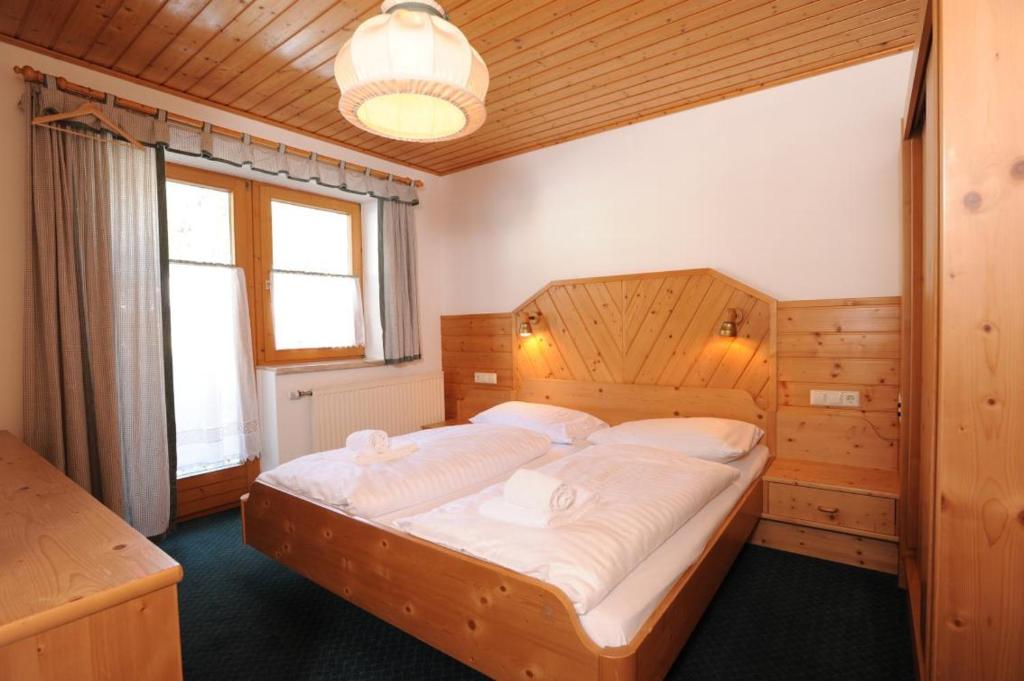 Postel nebo postele na pokoji v ubytování Chalet Alice by Schladmingurlaub