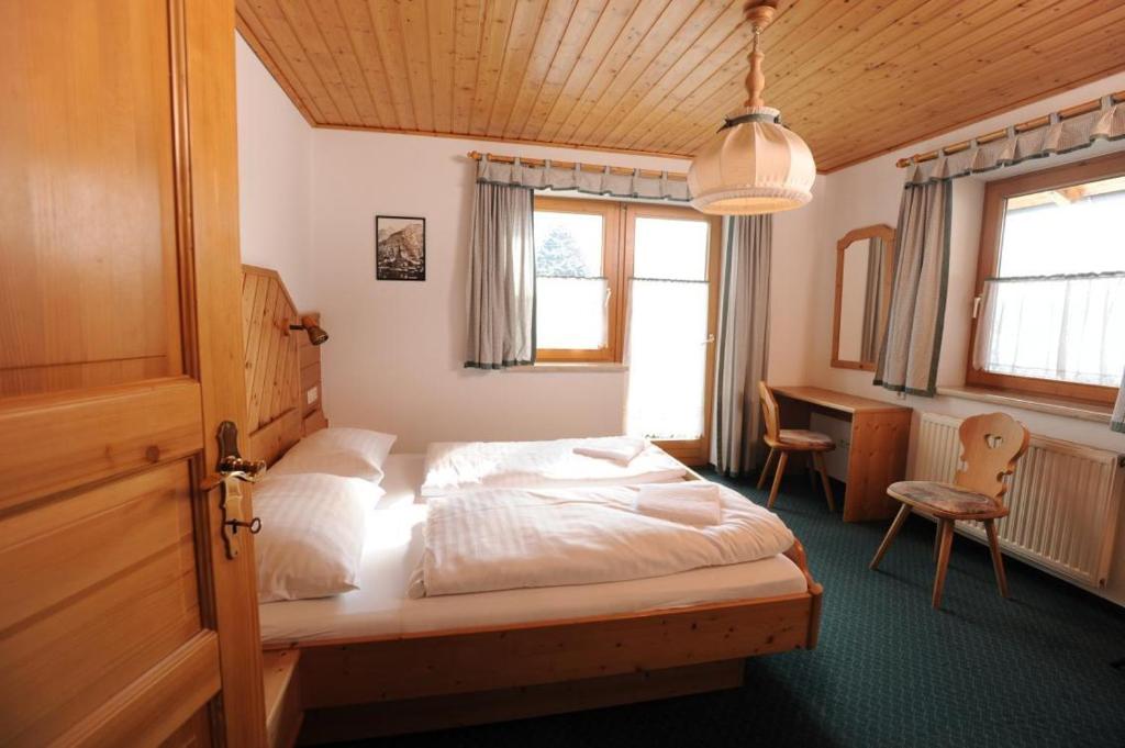 Postel nebo postele na pokoji v ubytování Chalet Alice by Schladmingurlaub