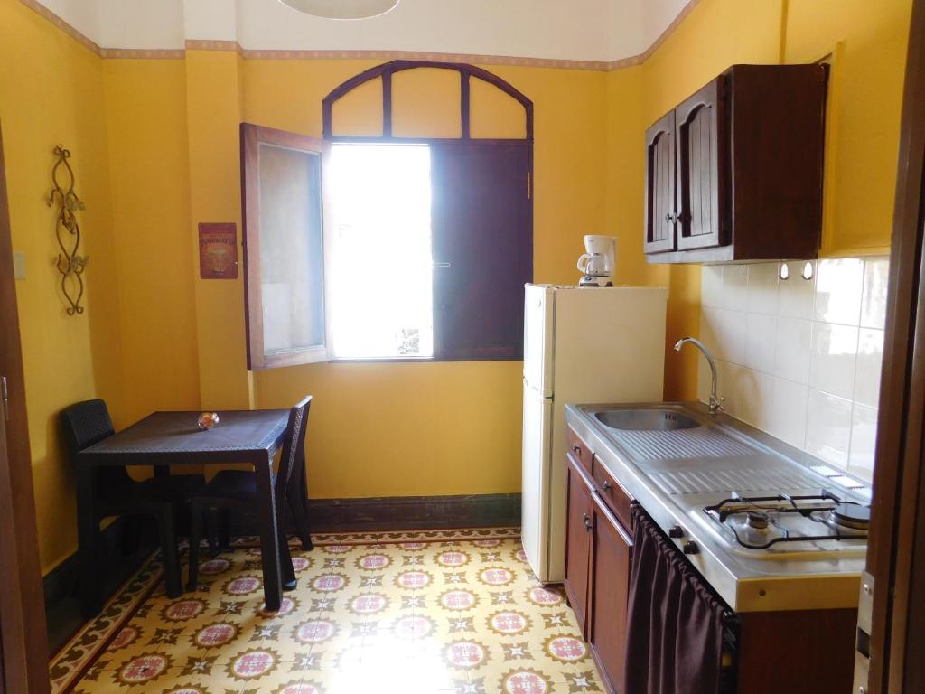 Η κουζίνα ή μικρή κουζίνα στο Residencial La Fonte