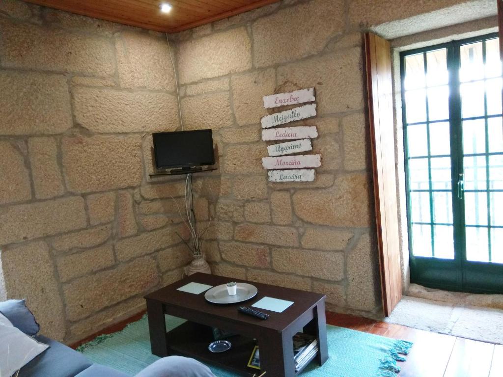 TV a/nebo společenská místnost v ubytování La Torre Mondariz