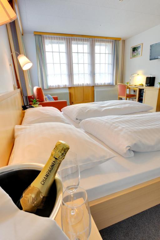 Postel nebo postele na pokoji v ubytování Hotel Alpenruh