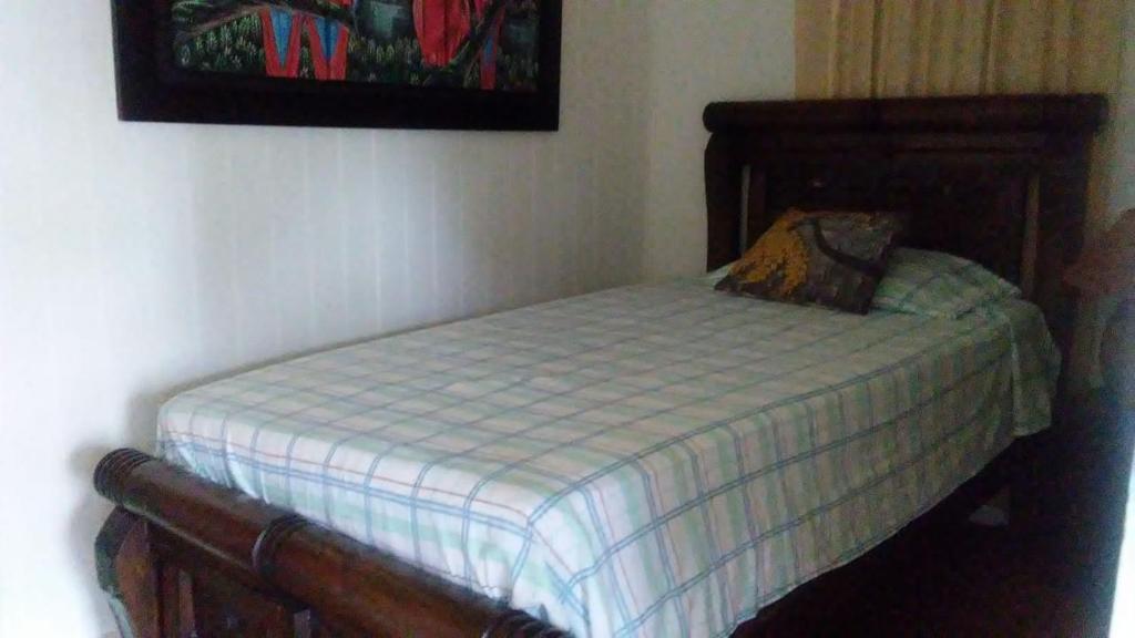 Postel nebo postele na pokoji v ubytování Posada Nativa Licy