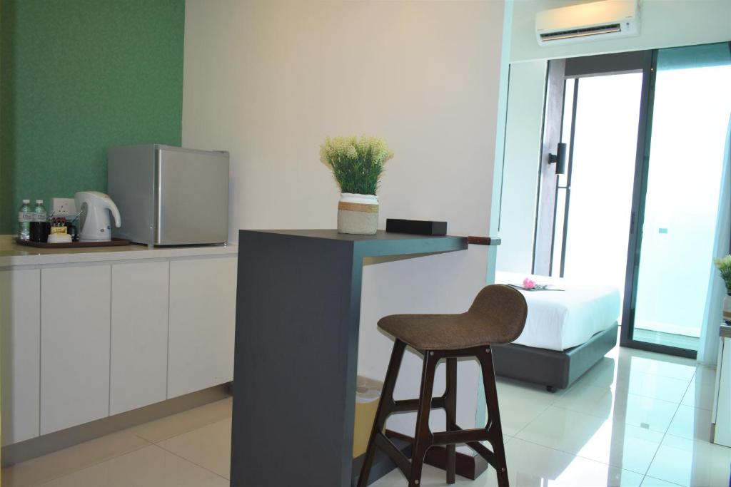 Kuchyň nebo kuchyňský kout v ubytování D'Wharf Hotel & Serviced Residence