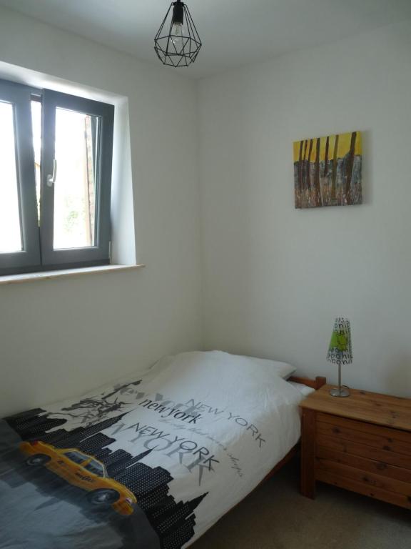 Postel nebo postele na pokoji v ubytování Gîte Aische-en-Refail