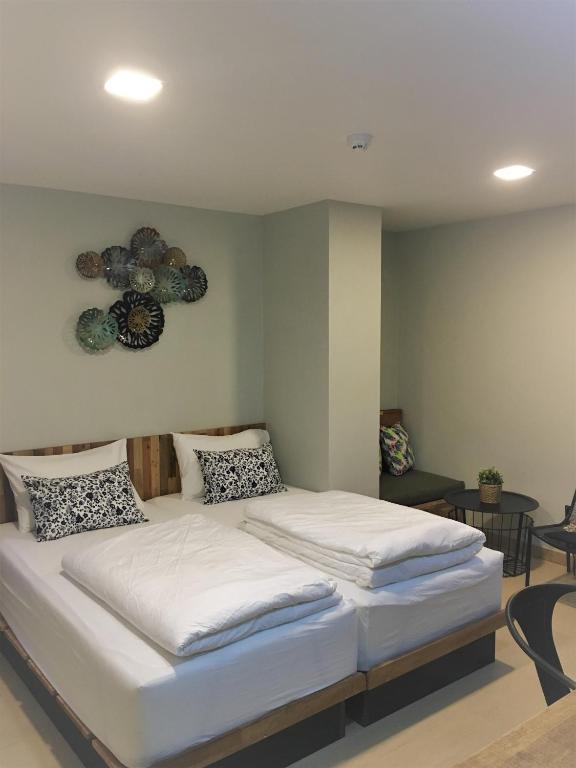 Postel nebo postele na pokoji v ubytování Bangkok Saran Poshtel