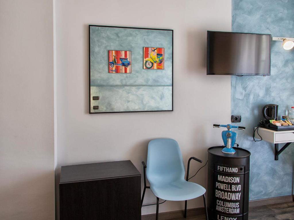 TV a/nebo společenská místnost v ubytování Hotel Napoleon Susa