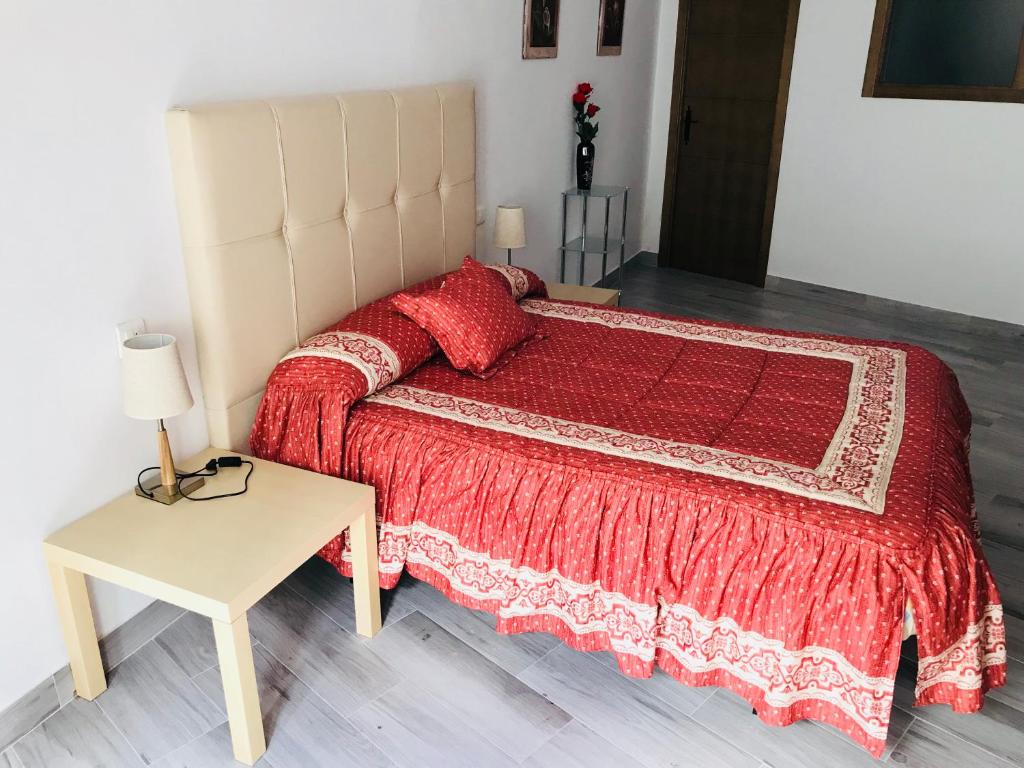Cama o camas de una habitación en Casa Rural Setenil