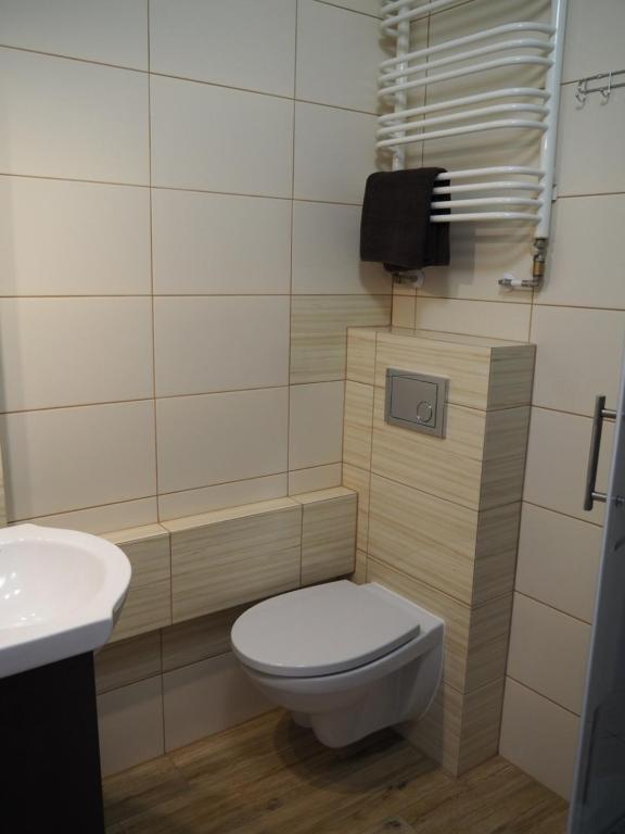 Kúpeľňa v ubytovaní Apartament Mrągowska - Żabi Staw