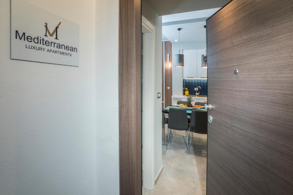 A kitchen or kitchenette at Mediterranean Luxury Apartment