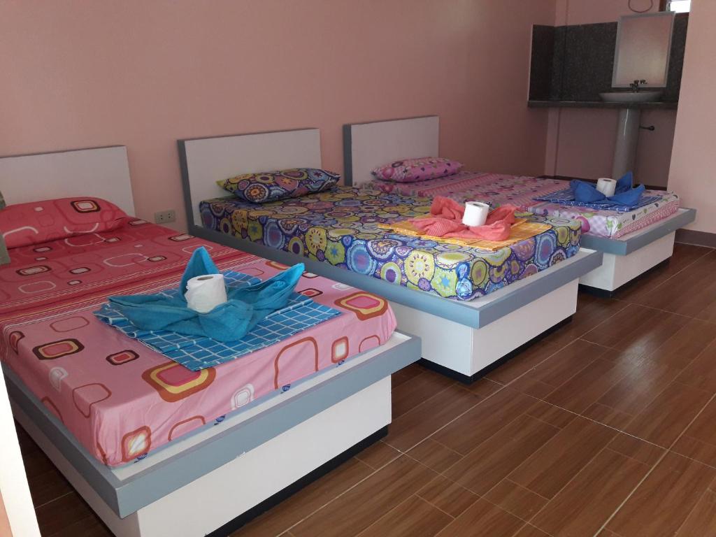 Postel nebo postele na pokoji v ubytování cubby's guesthouse