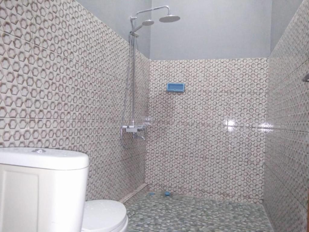 Koupelna v ubytování Sawe Homestay