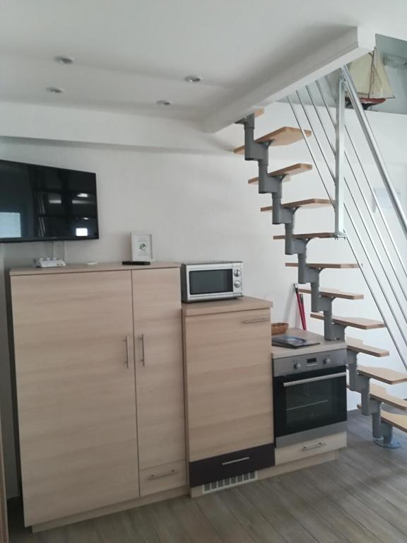 Kuchyň nebo kuchyňský kout v ubytování Apartments Vrime