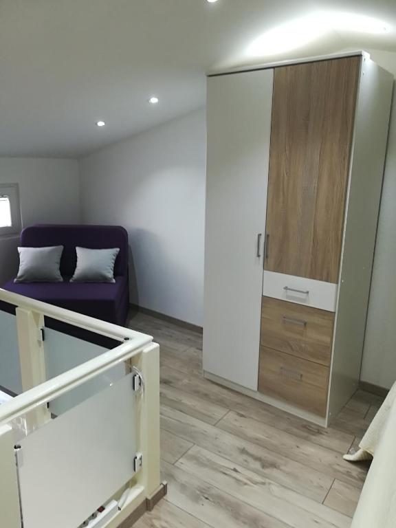 Postel nebo postele na pokoji v ubytování Apartments Vrime