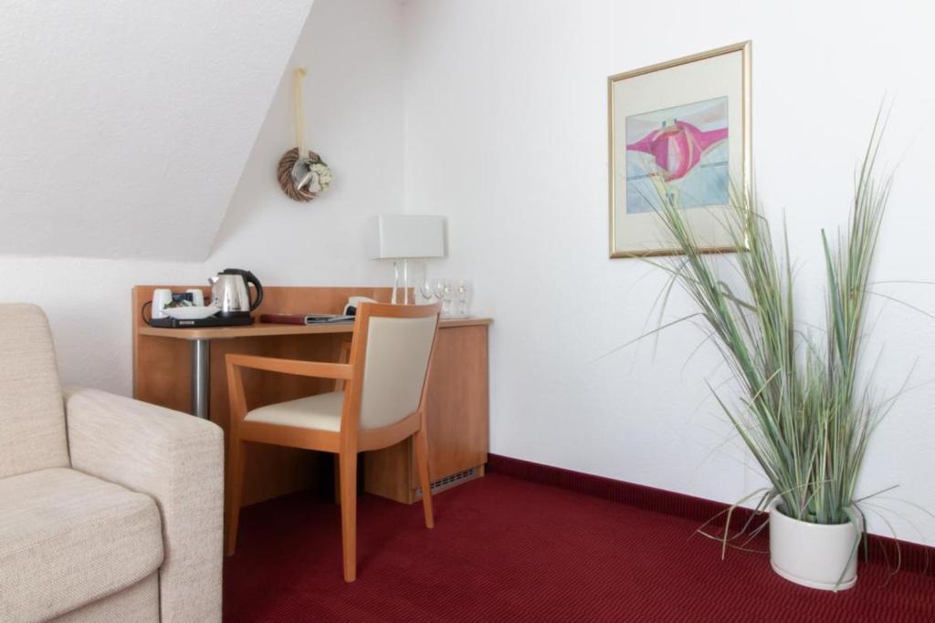 Posezení v ubytování Hotel Ostseeresidenz Cammann Grömitz