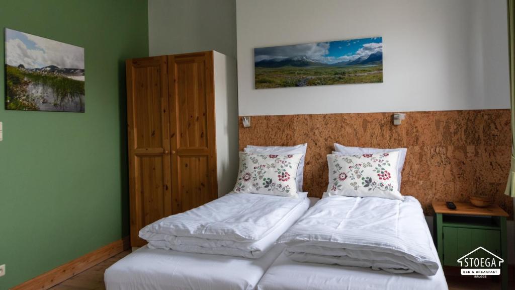 Postel nebo postele na pokoji v ubytování B&B Stoega