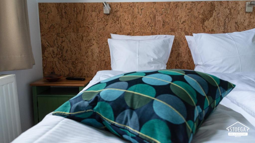 Postel nebo postele na pokoji v ubytování B&B Stoega