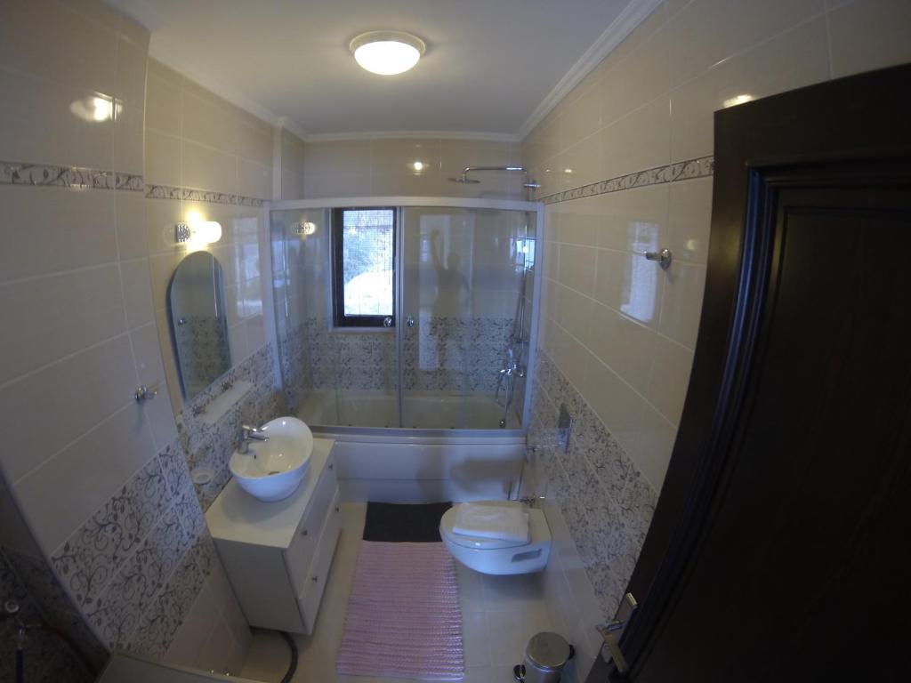 Koupelna v ubytování Derya Beach Apartment