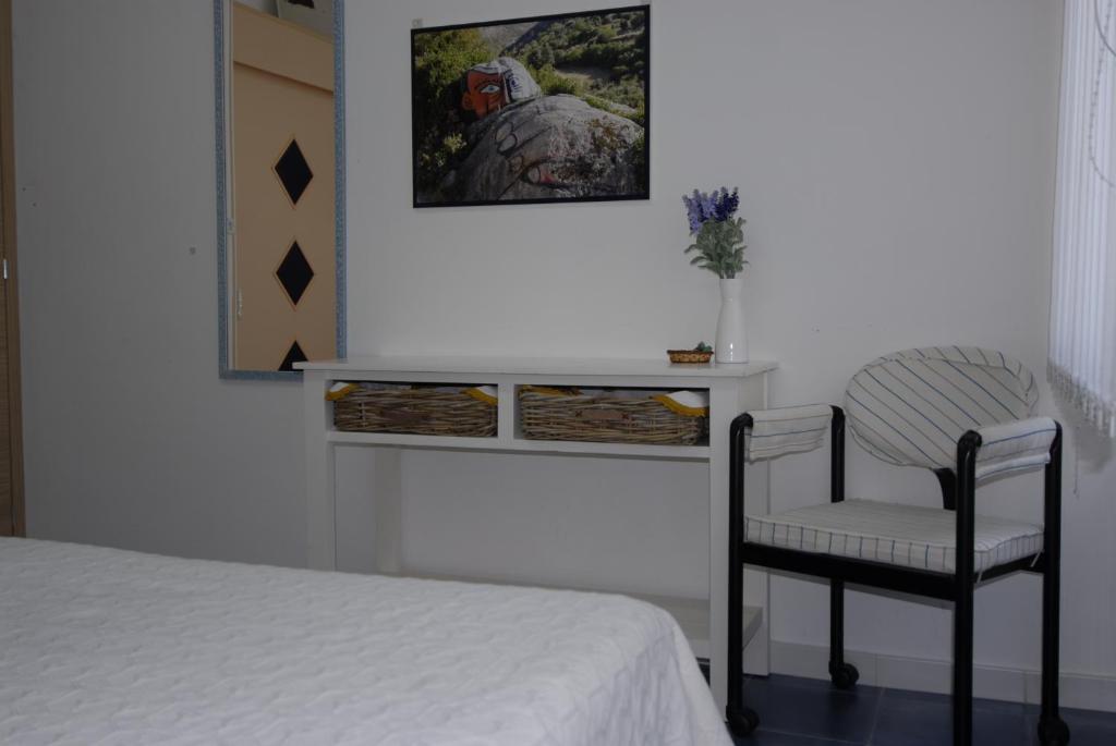 Postel nebo postele na pokoji v ubytování Nughe 'e' Oro Guesthouse