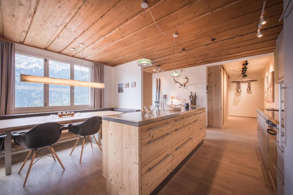 Kuchyň nebo kuchyňský kout v ubytování Schweizerheim Residence 11