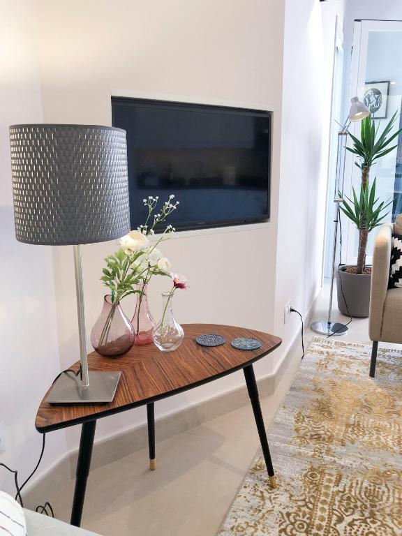 Telewizja i/lub zestaw kina domowego w obiekcie La Tierra Sur apartment Malaga Center