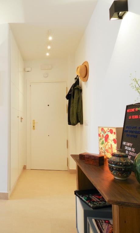 Telewizja i/lub zestaw kina domowego w obiekcie La Tierra Sur apartment Malaga Center