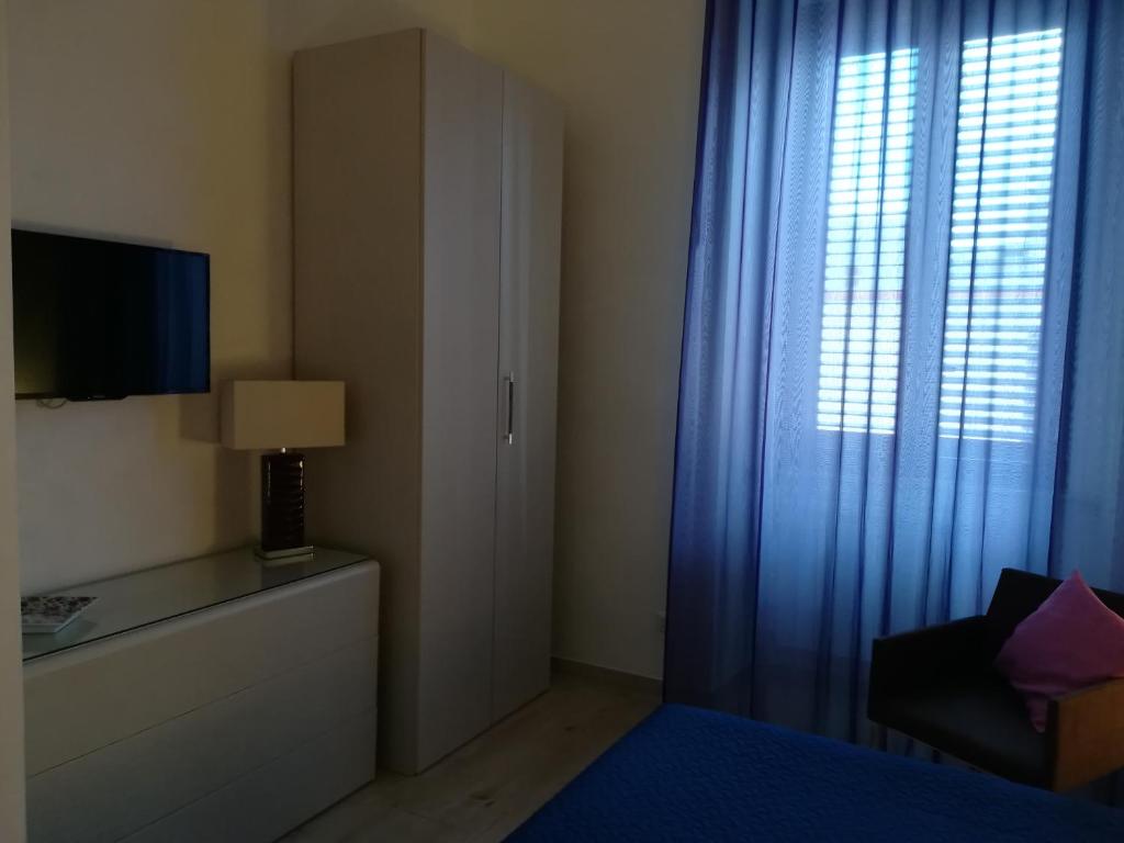 Posteľ alebo postele v izbe v ubytovaní Affittacamere Massimo D'Azeglio