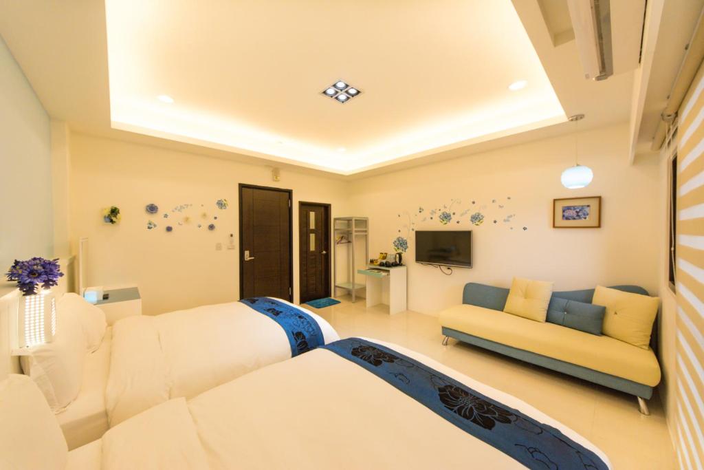 TV a/nebo společenská místnost v ubytování Pure B&B