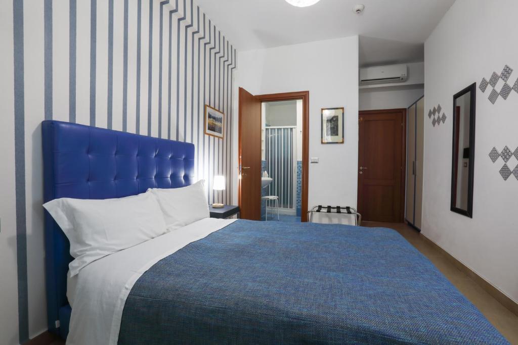 Postel nebo postele na pokoji v ubytování B&B Night&Day