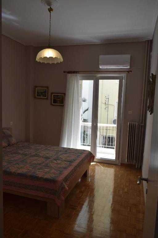 Postel nebo postele na pokoji v ubytování George apartment