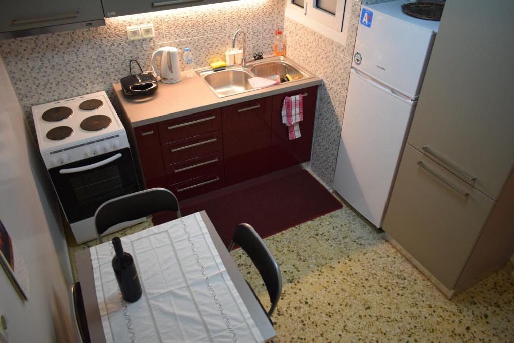 Kuchyň nebo kuchyňský kout v ubytování George apartment